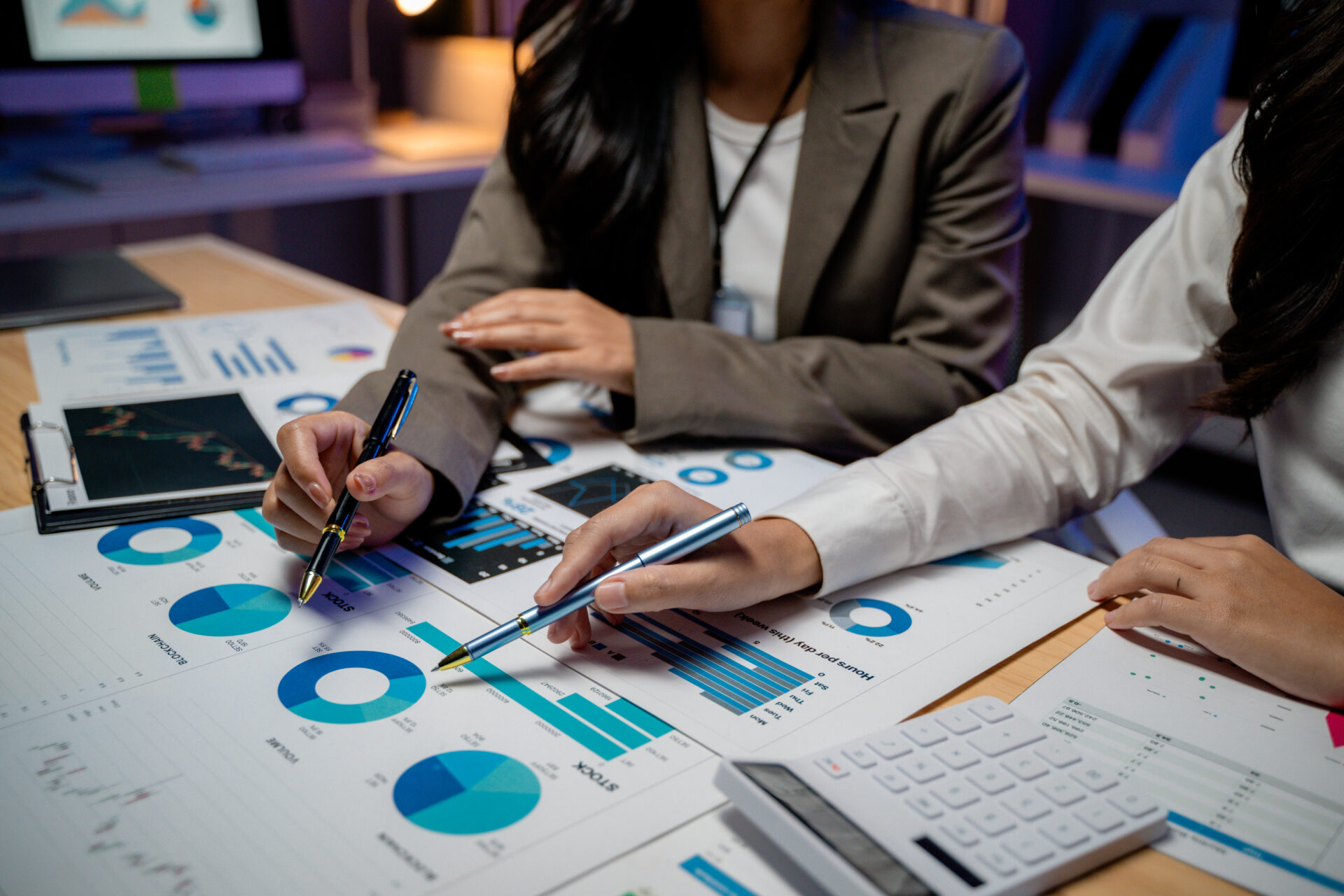 Businesswomen analyzing financial charts and graph 2026 01 09 10 13 24 utc e1770714207354