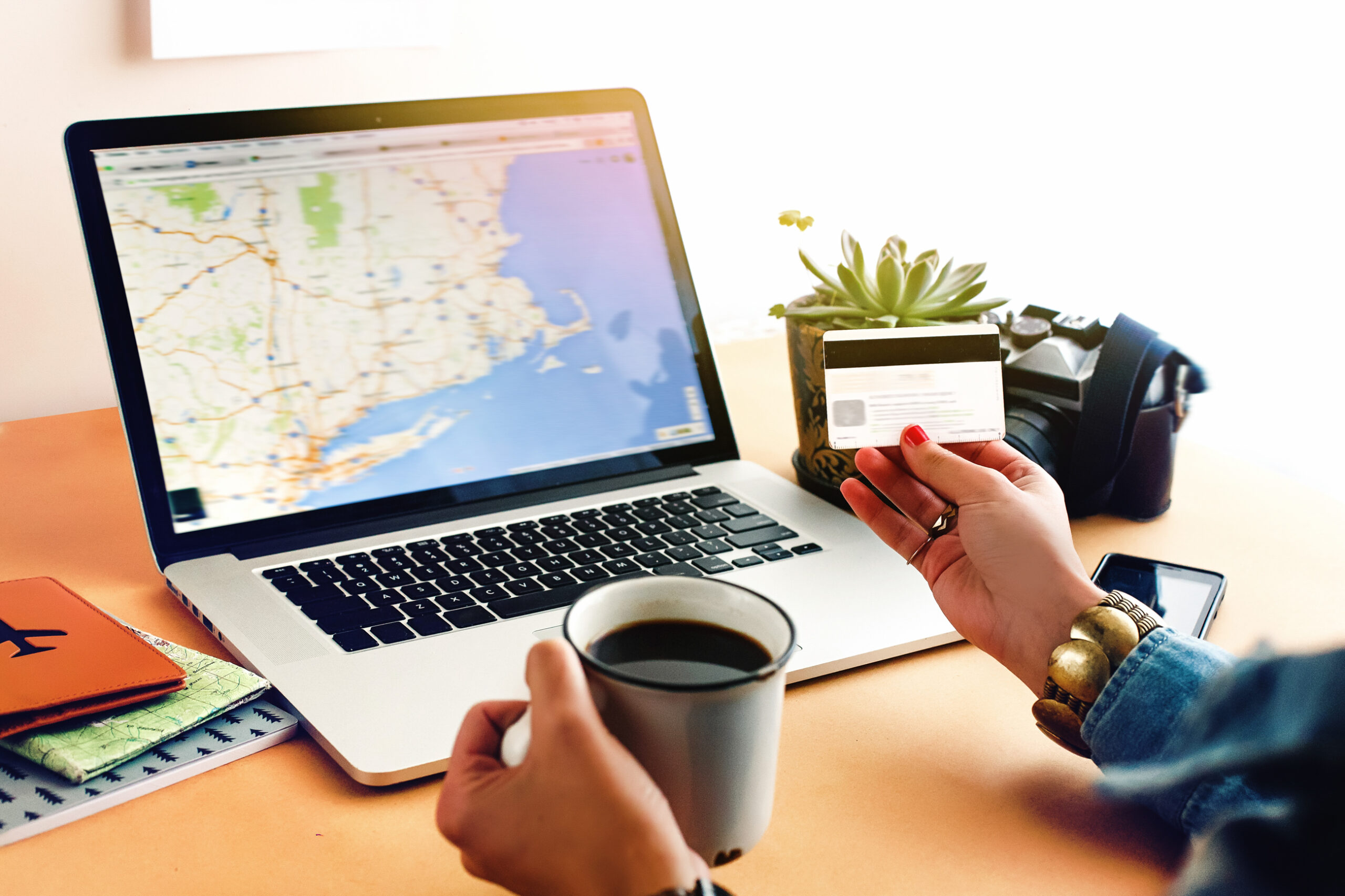 Stylish girl holding coffee on background of lapto 2026 01 08 22 52 15 utc scaled